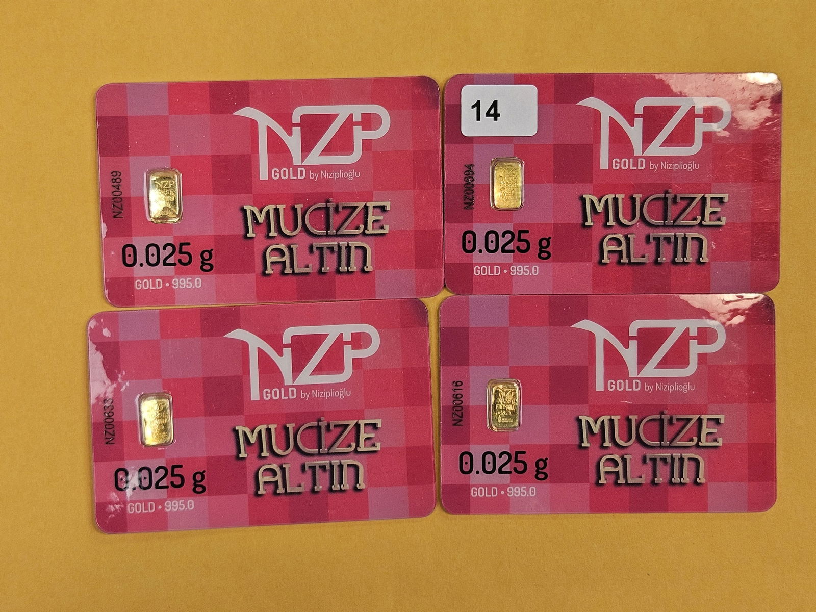GOLD! Four NZP Turkey .995 fine gold bars in Assay Holders: By Niziplioglu. Weighs .025 grams each 