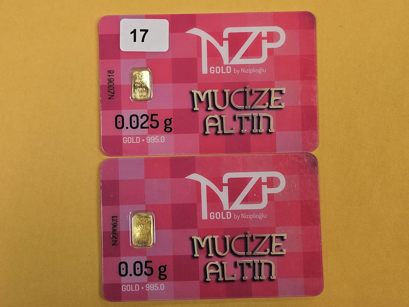 GOLD! Two NZP Turkey .995 fine gold bars in Assay Holders: By Niziplioglu. Weighs .05 grams and .025 grams