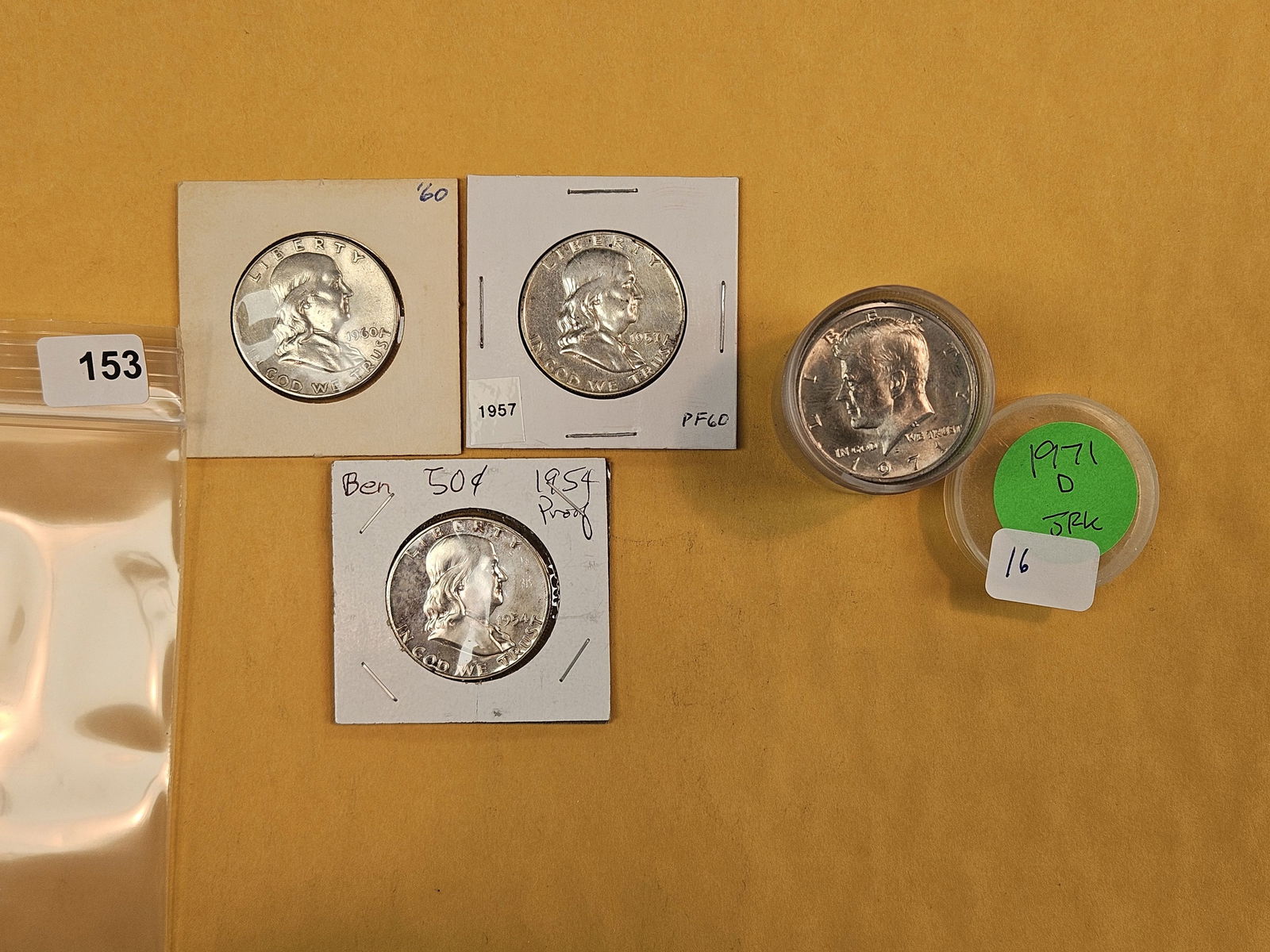 Silver and clad half-dollar mix: Three silver Franklins and sixteen clad 1971-D Kennedy