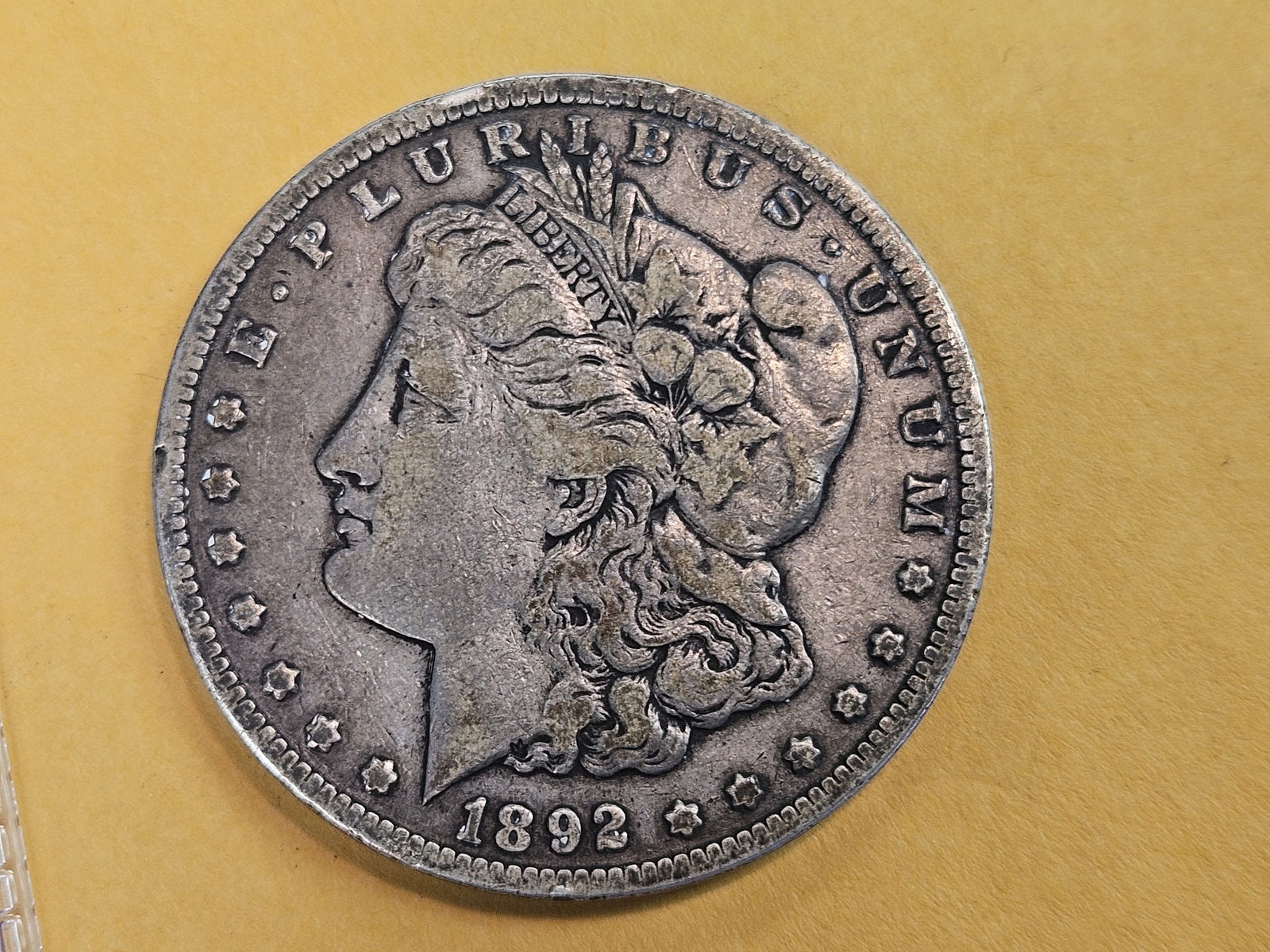 ** KEY DATE ** 1892-CC Morgan silver Dollar in Very Fine (1 of 3)