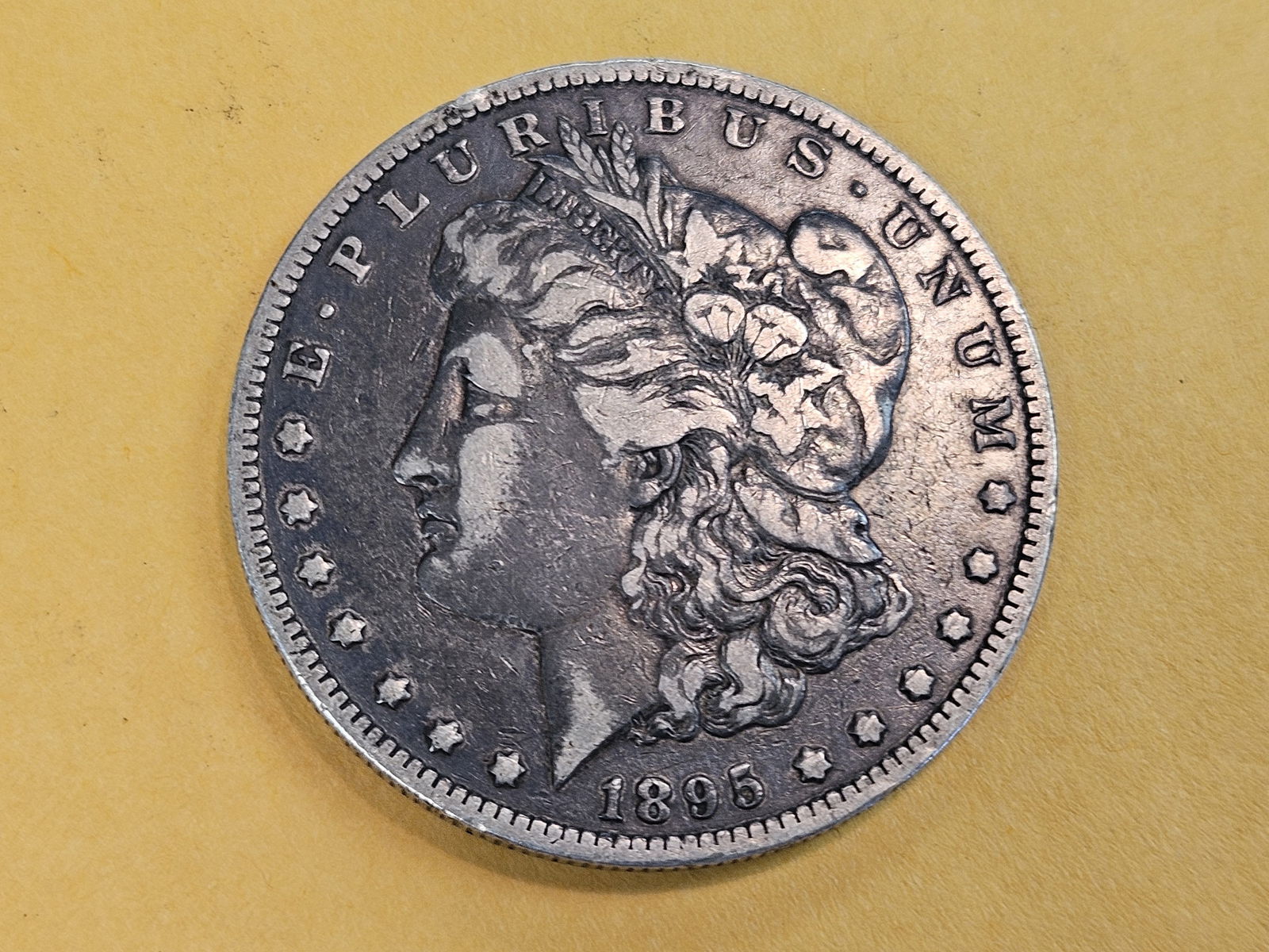 ** KEY DATE ** 1895-O Morgan silver Dollar in Very Fine - 30 (1 of 4)