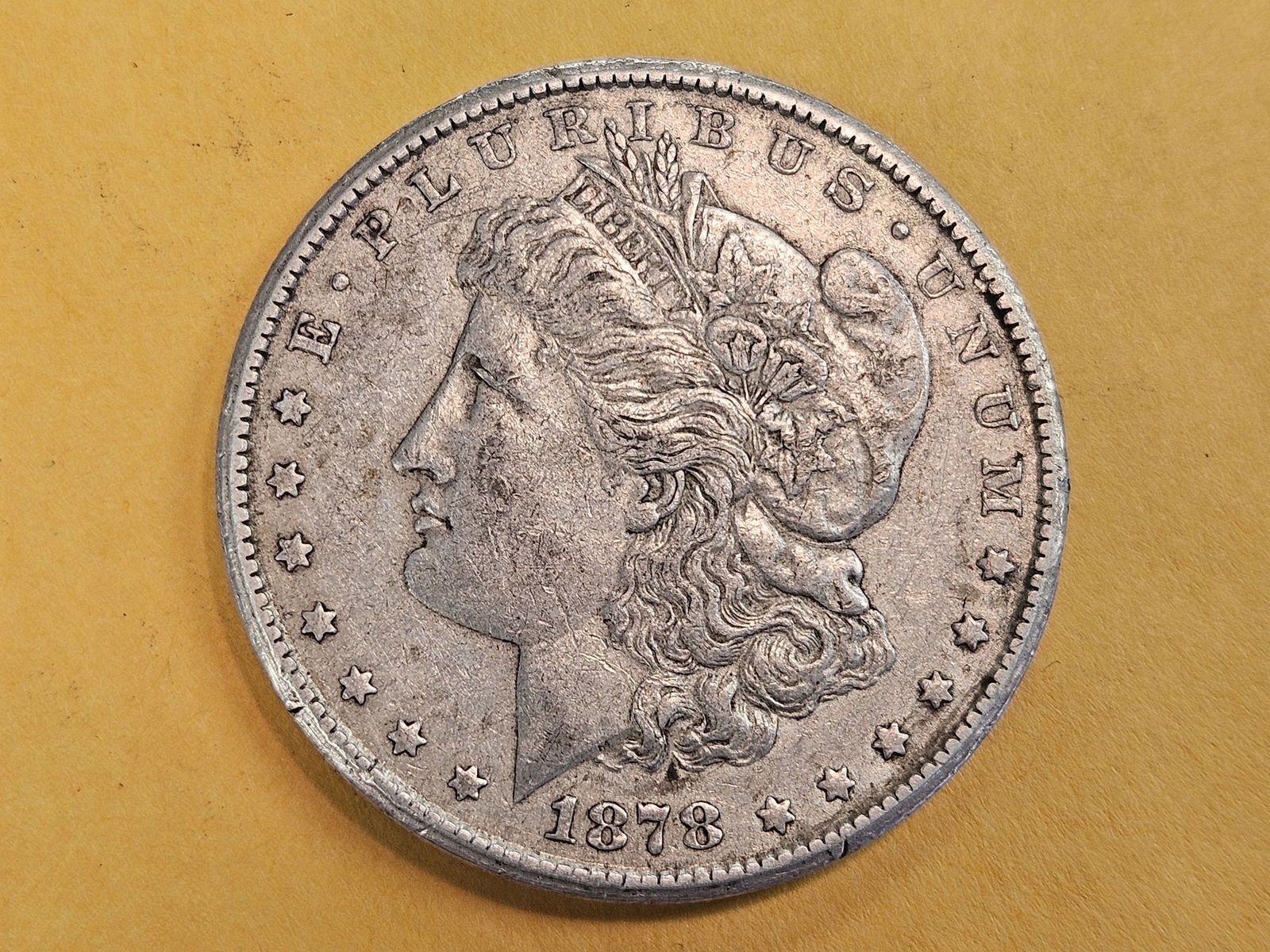 ** KEY DATE ** 1878-CC Morgan silver Dollar in About Uncirculated - 50 (1 of 4)