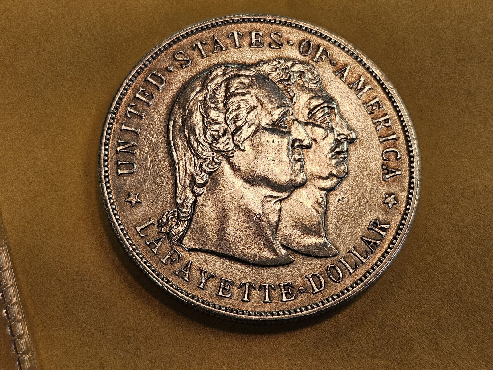 ** KEY DATE COMMEMORATIVE ** Choice Brilliant Uncirculated - details 1900 Lafayette silver dollar: Super cool piece with great history! This beauty is Uncirculated and a straight grade would likely be in the 63 - 64 range. Has been lightly cleaned 