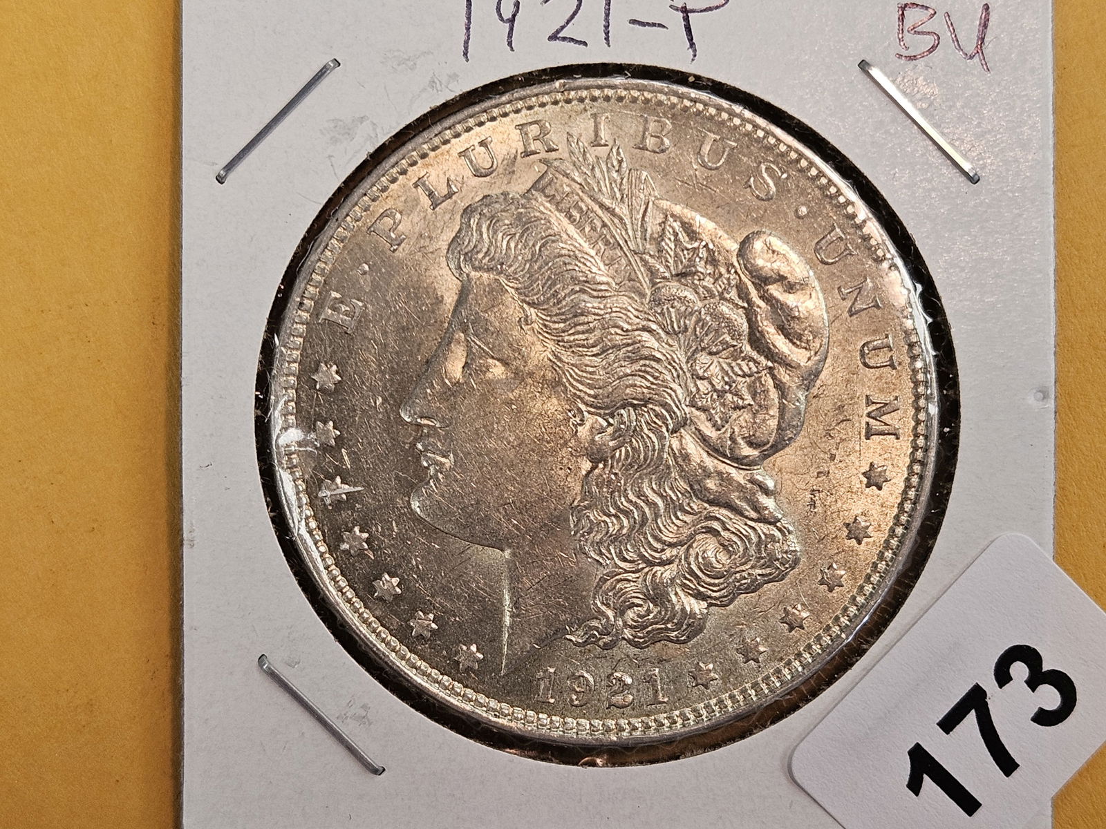 Brilliant Uncirculated plus 1921 Morgan silver Dollar: Good luster 