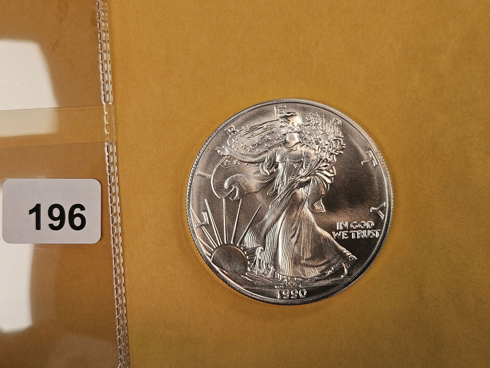 GEM Brilliant Uncirculated 1990 American Silver Eagle: Roll Fresh 
