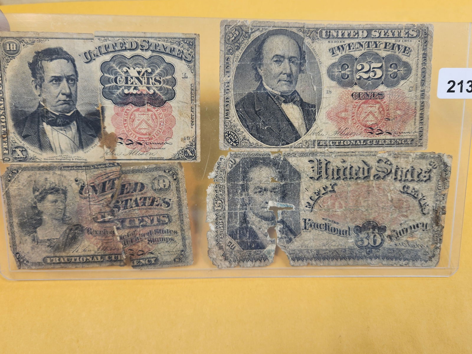 Four mixed pieces of Fractional Currency: Ten, 25 and fifty cent fractionals 