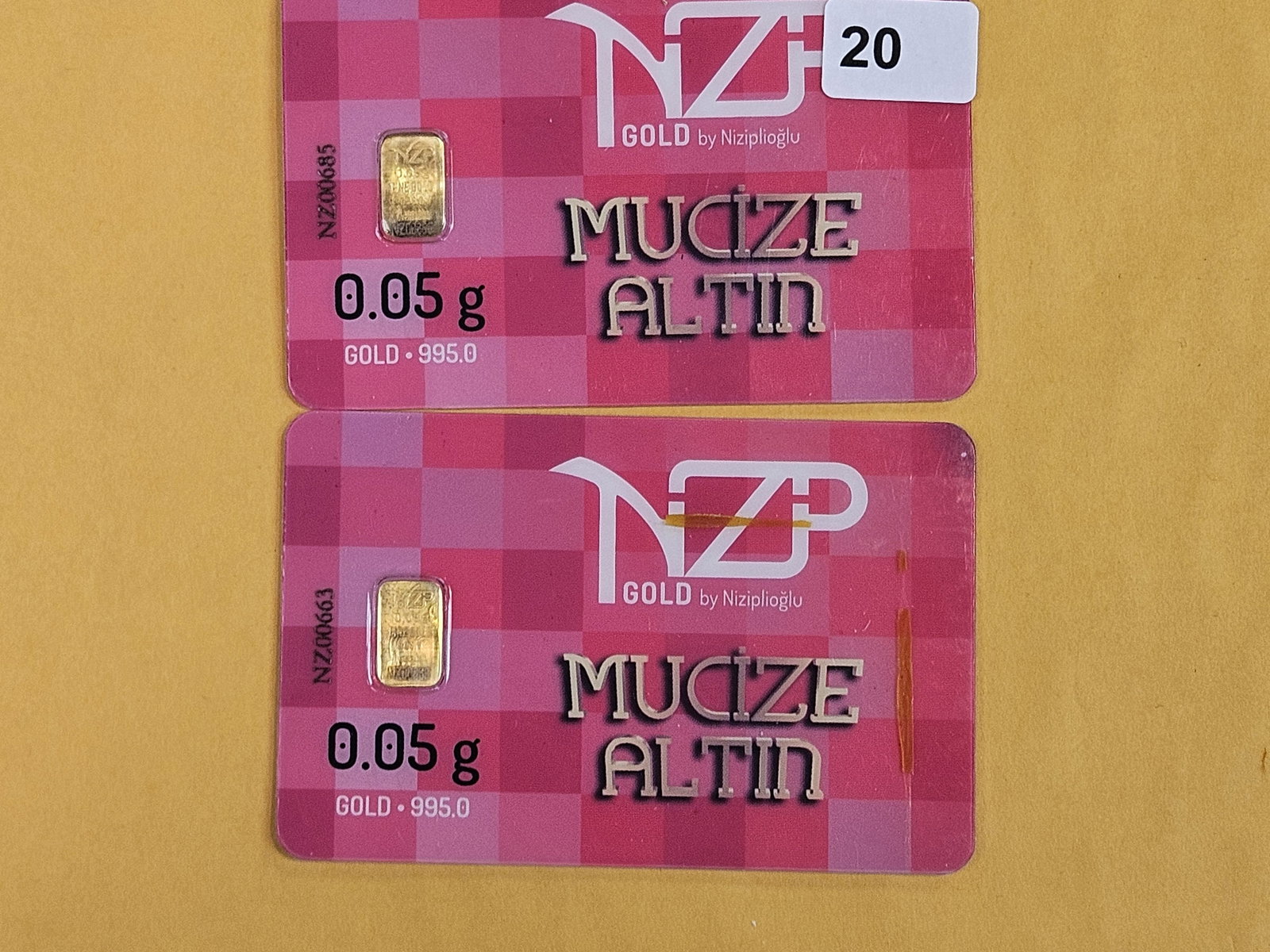 GOLD! Two NZP Turkey Gold .995 Gold Bars in Assay Holders: NZP Gold by Niziplioglu. Both weigh .05 grams