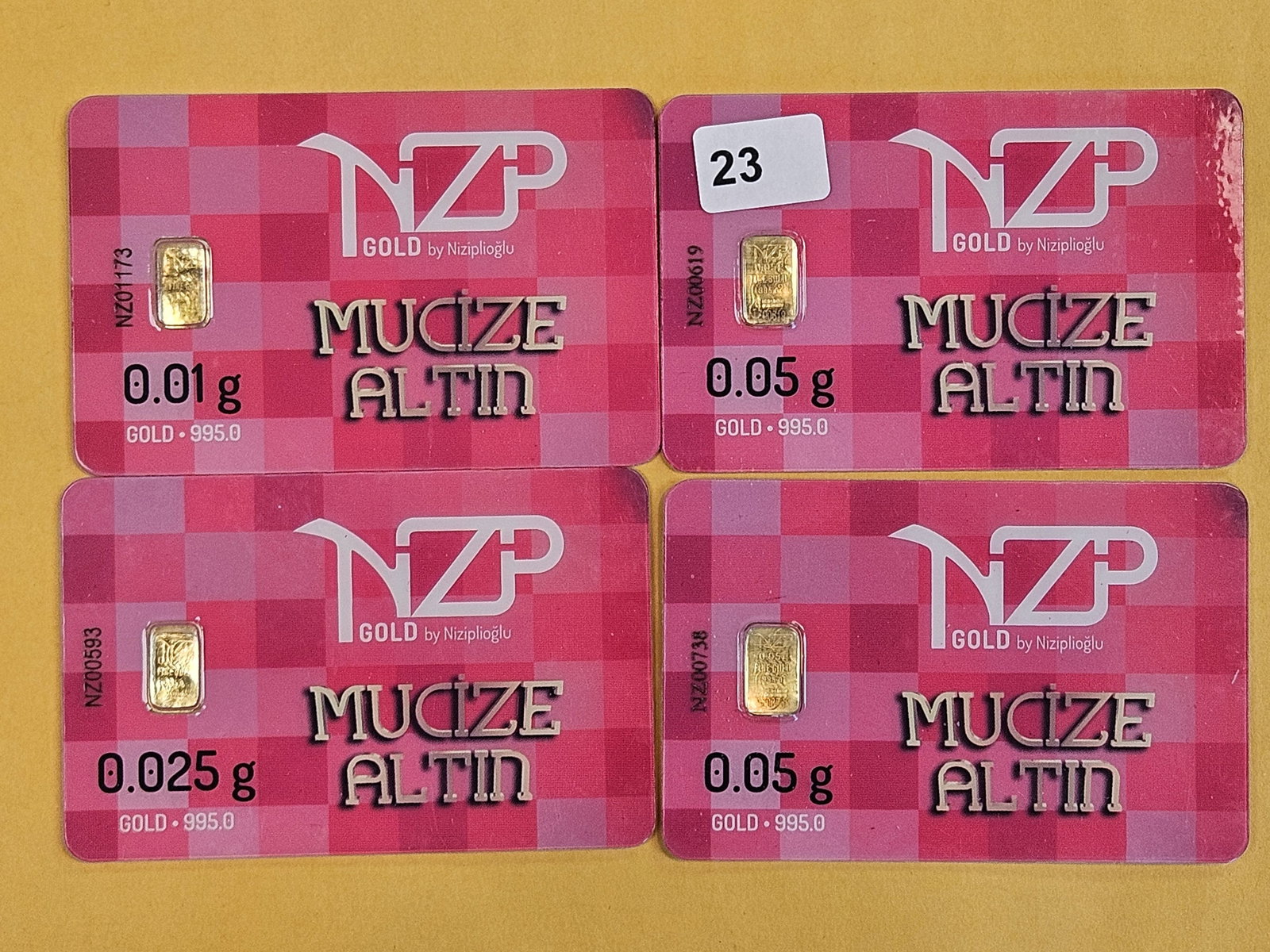 GOLD! Four NZP Turkey Gold .995 Gold Bars in Assay Holders: NZP Gold by Niziplioglu. Mixed weights 