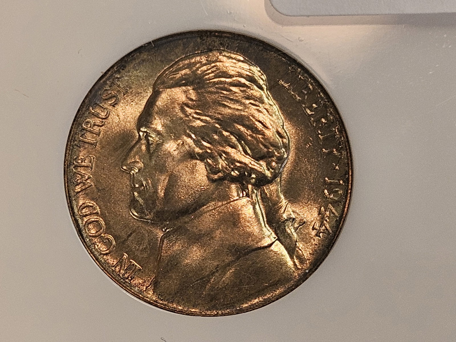 Superb GEM! NGC 1944-D Silver Wartime Jefferson Nickel in Mint State 67: Stellar looking coin! Excellent patina! Near full steps. In an old fatty holder 