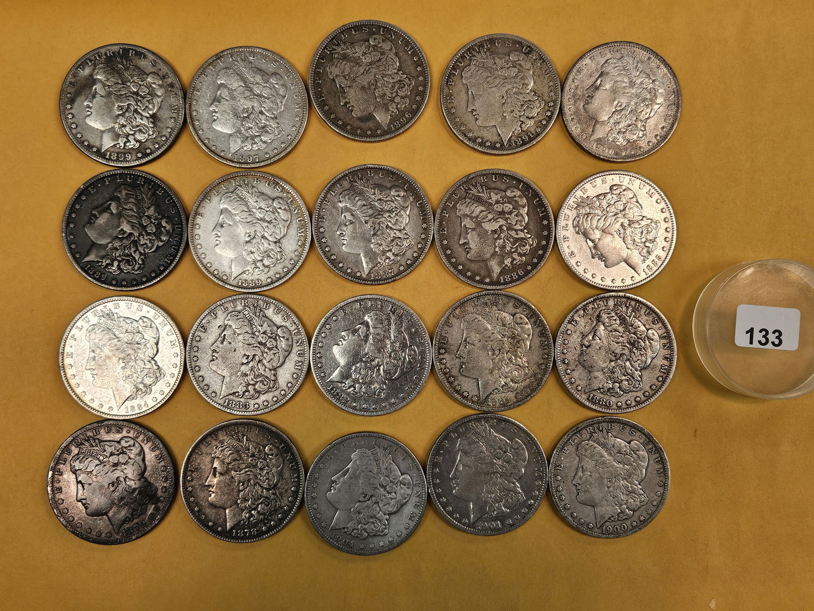 ** FULL ROLL ** Twenty Morgan Silver Dollars: All pre-1904. Grades from Very Fine through Brilliant About Uncirculated plus - details