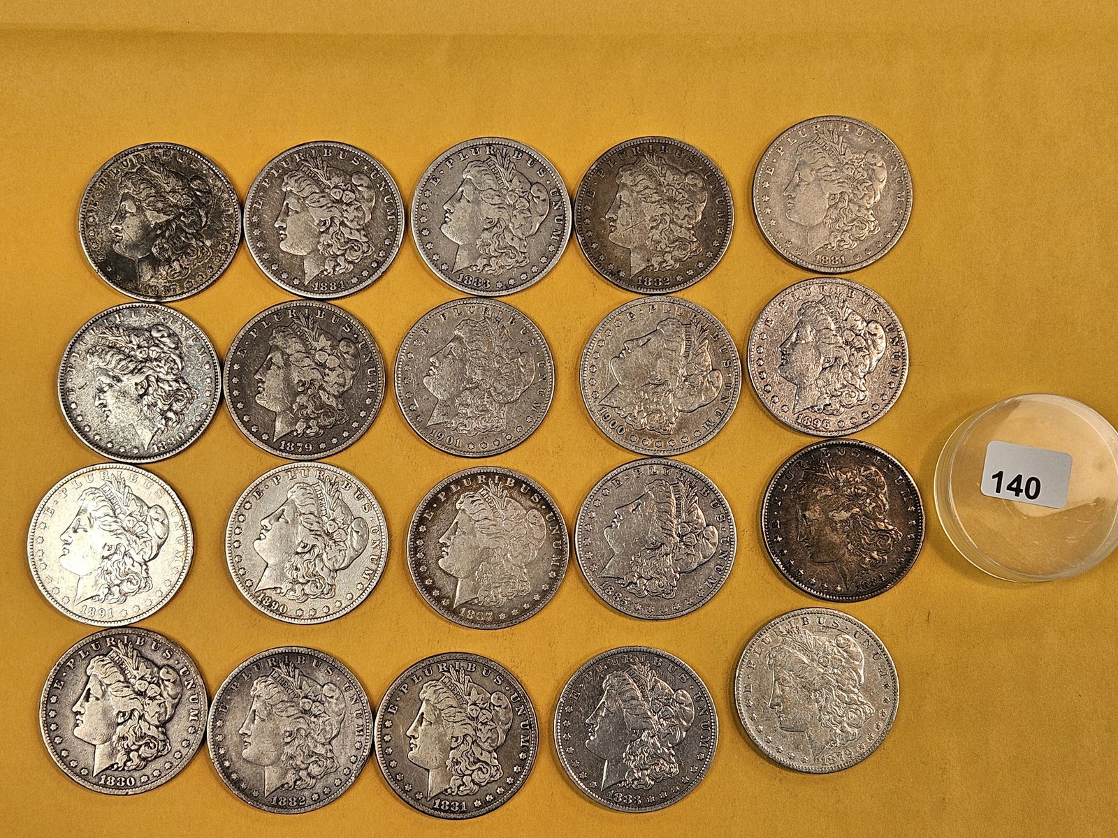 ** FULL ROLL ** Twenty Morgan Silver Dollars: All pre-1904. Grades from Very Fine through About Uncirculated - details