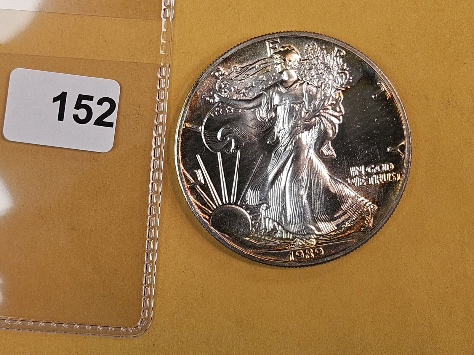 GEM Brilliant Uncirculated 1989 American Silver Eagle: More gorgeous album toning! 