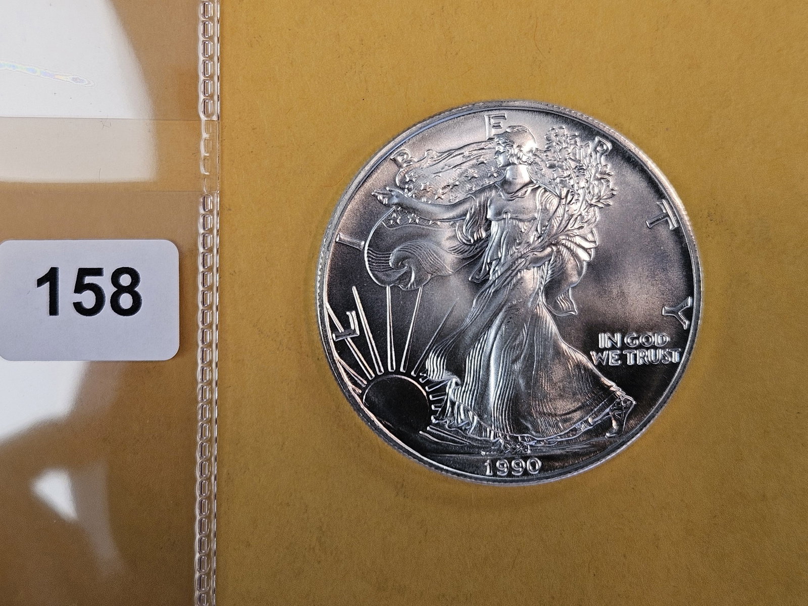 GEM Brilliant Uncirculated 1990 American Silver Eagle: Roll Fresh 
