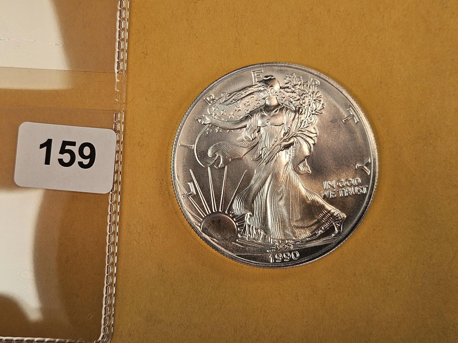 GEM Brilliant Uncirculated 1990 American Silver Eagle: Roll Fresh 