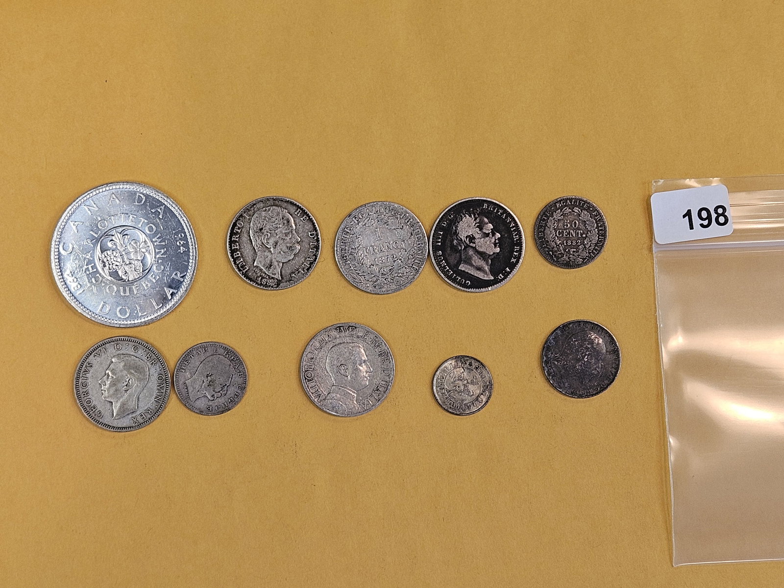 Ten mixed silver World coins (1 of 4)