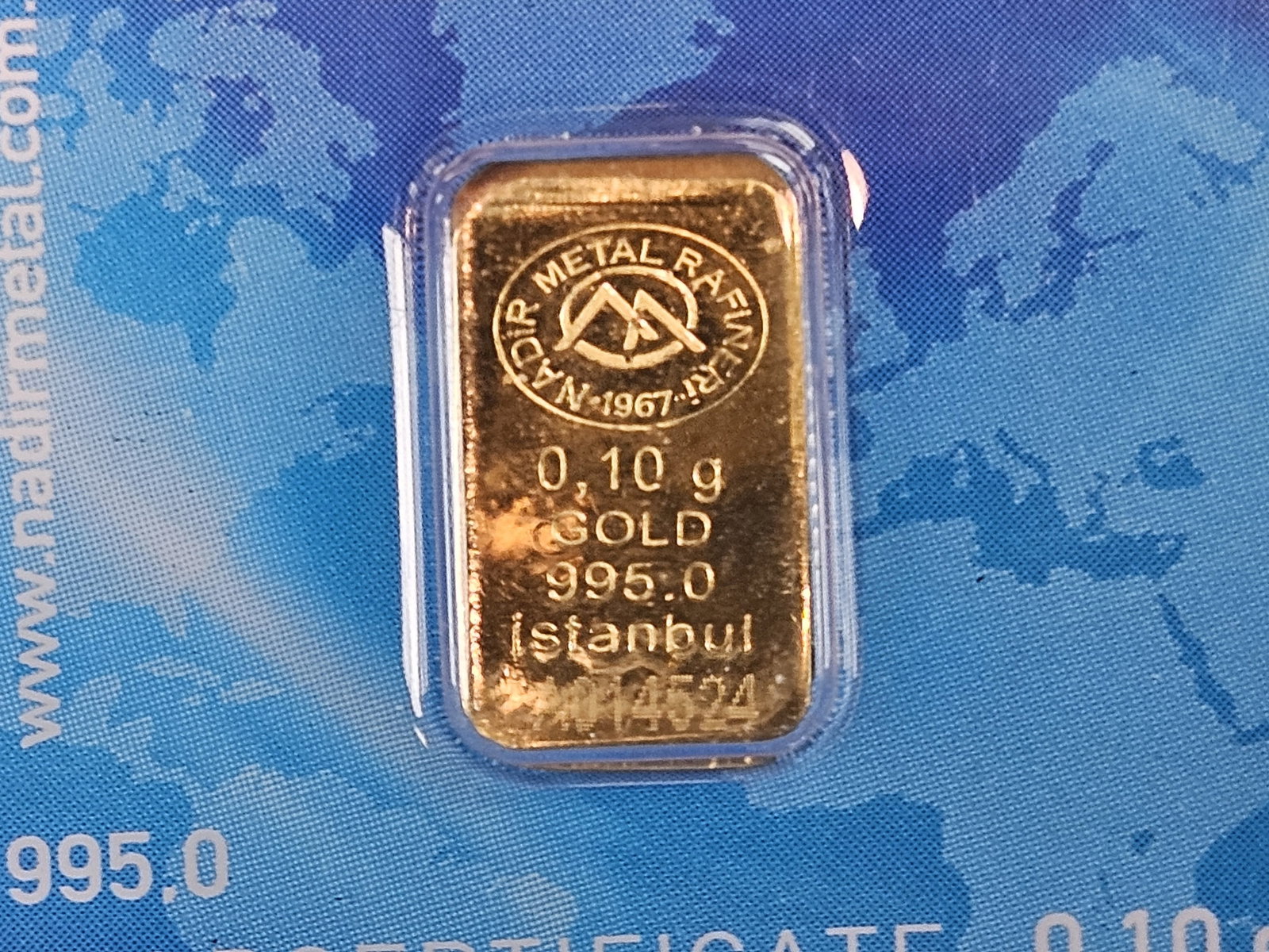 GOLD! Nadir .1 Gram .9999 fine gold bar: In assay holder 