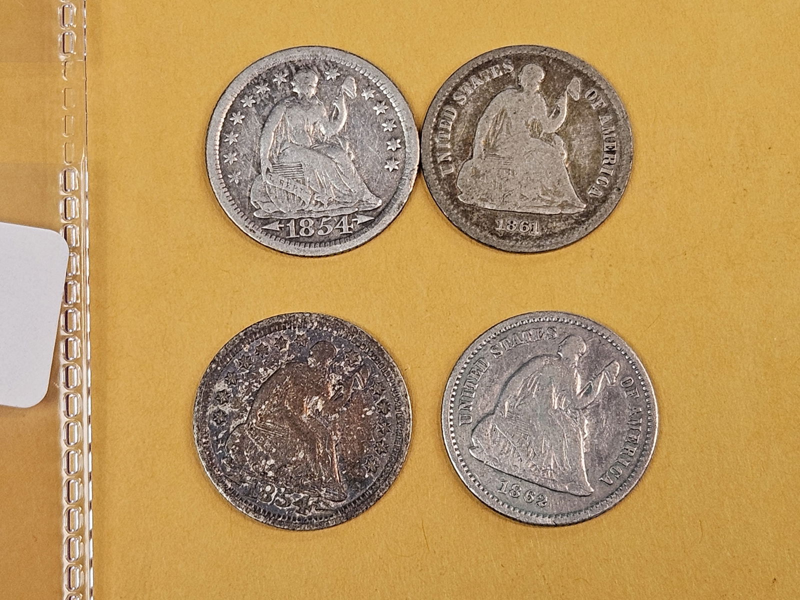 Four mixed Seated Liberty silver half-Dimes: 1854-O, 1854, 1861 and 1862 