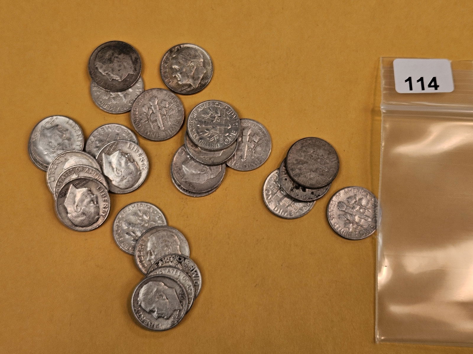 Twenty-five mixed silver Roosevelt Dimes: Circulated 