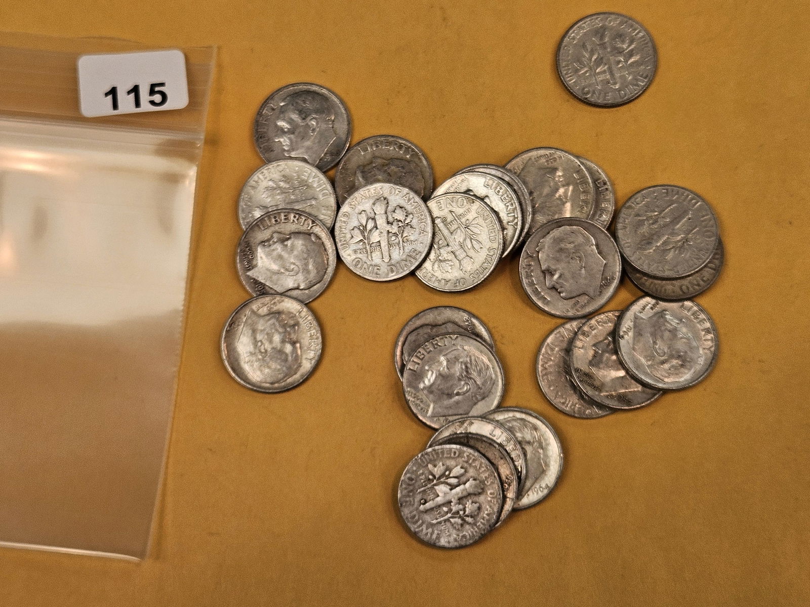 Twenty-five mixed silver Roosevelt Dimes: Circulated 