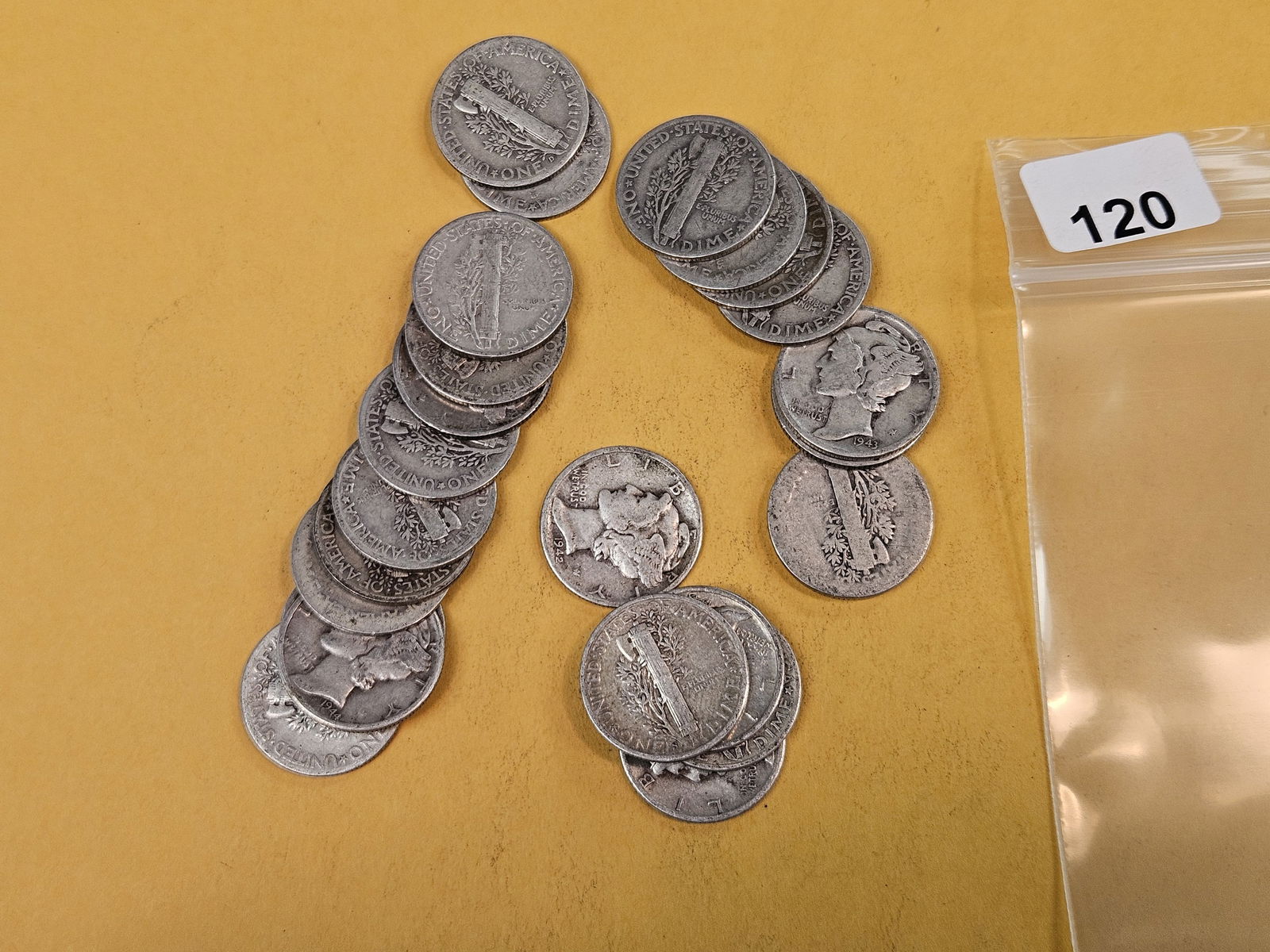 Twenty-five mixed silver Mercury Dimes: Circulated 