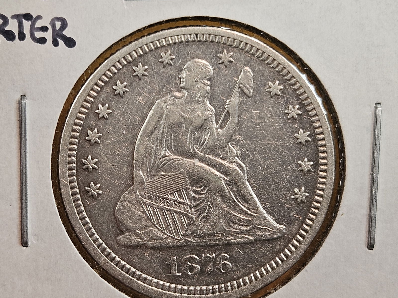 1876 Seated Liberty silver Quarter: In Very Fine plus to XF! 