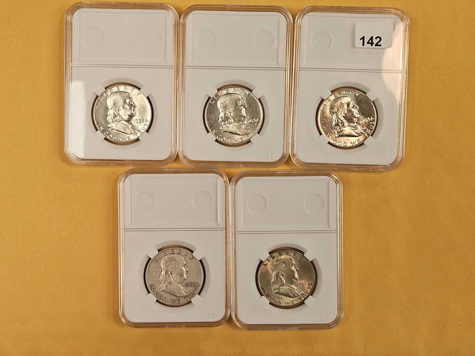 Five mixed silver Franklin Half Dollars: All circulated 