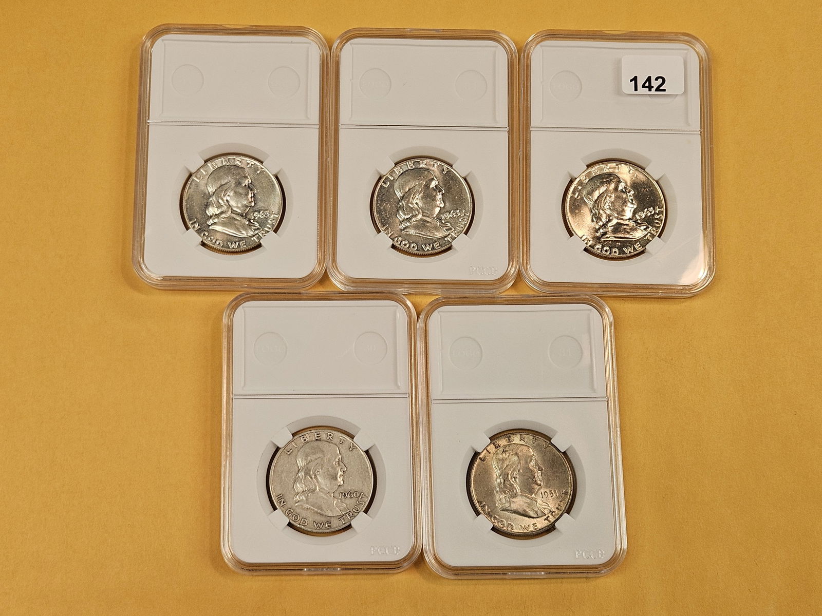 Five mixed silver Franklin Half Dollars - 2