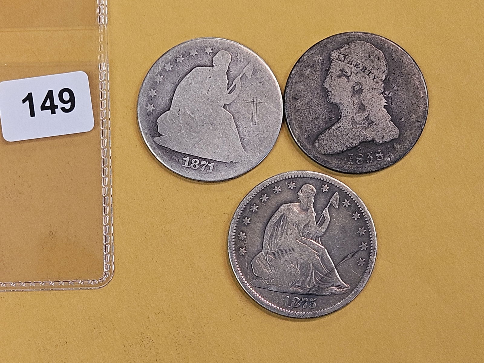 Three more, older, silver Half Dollars: 1871 Seated, 1875-S Seated and 1838 Bust 