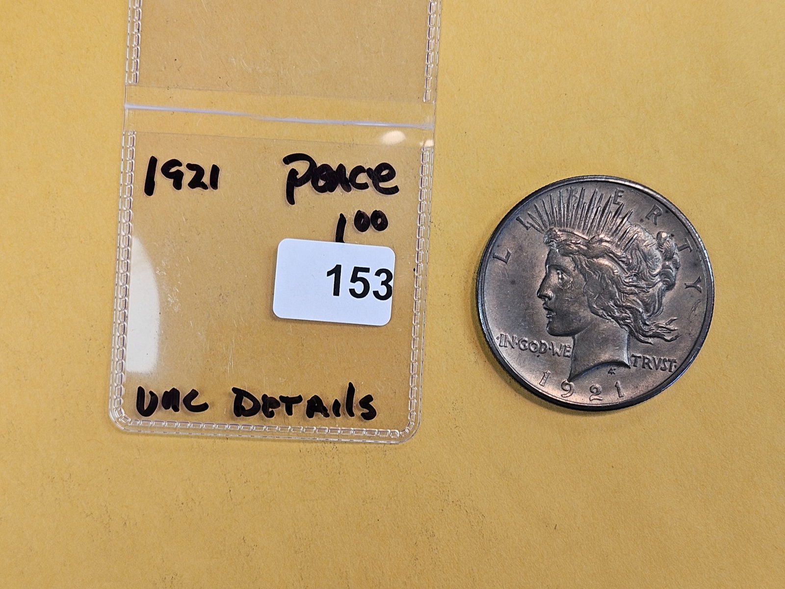 ** KEY DATE ** 1921 Peace silver Dollar in Uncirculated - details - 2