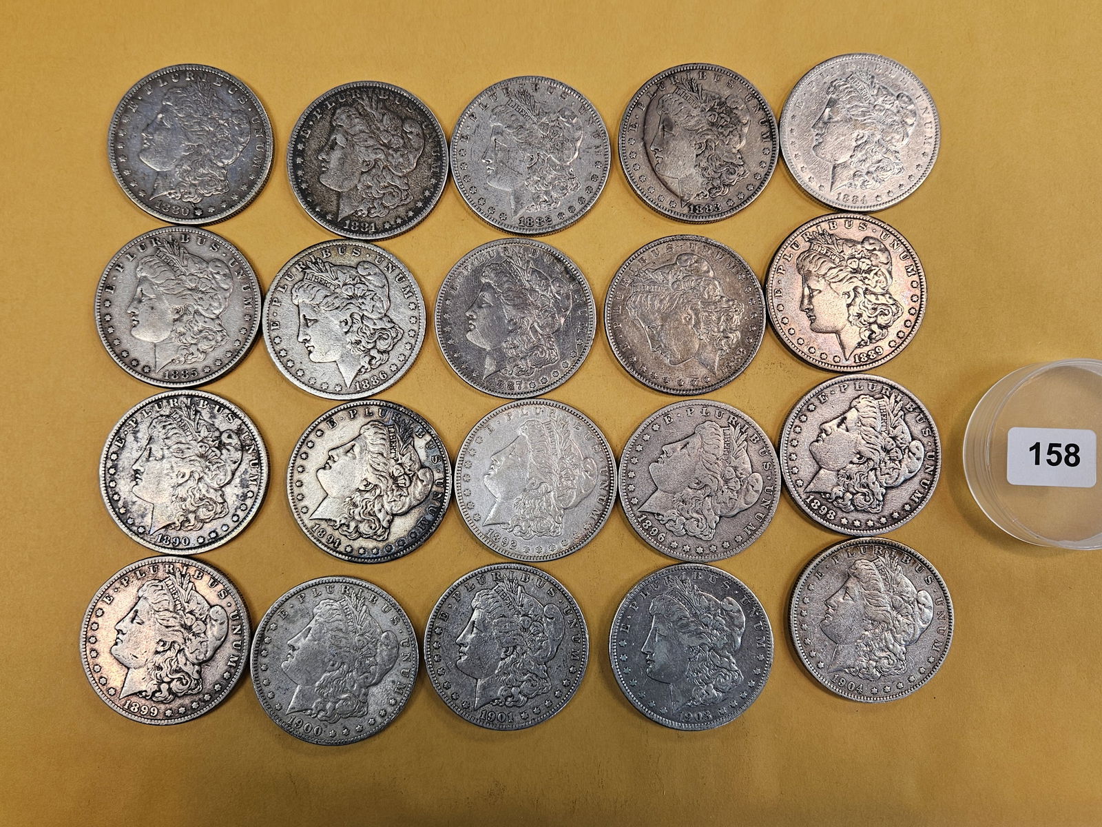 ** FULL ROLL ** Twenty Morgan silver Dollars: All pre-1904. Grades from Very Fine through About Uncirculated 