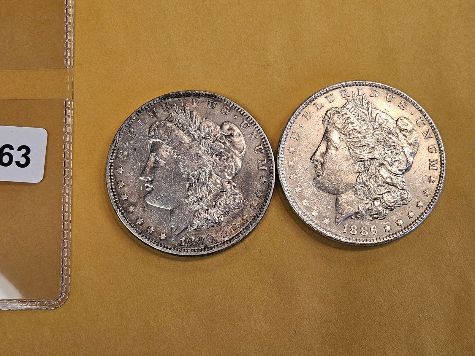Two Brilliant About Uncirculated plus Morgan Silver Dollars (1 of 2)