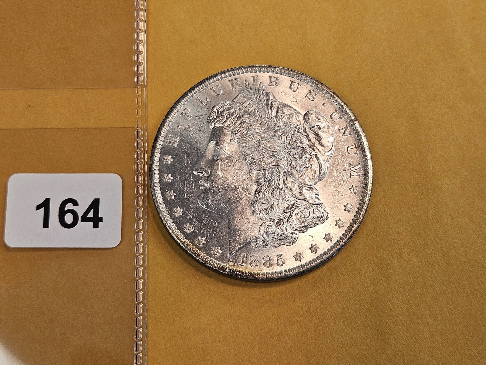 Brilliant Uncirculated 1885-O Morgan silver Dollar - 2