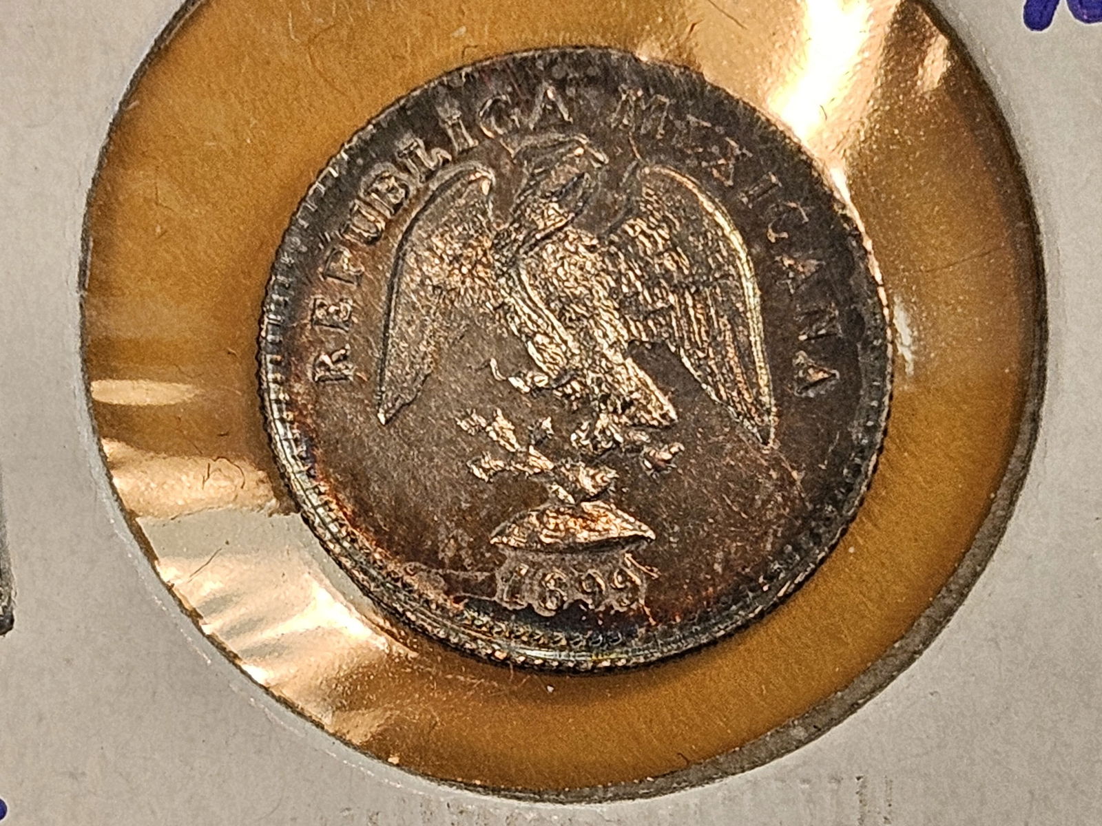 Choice Brilliant Uncirculated 1899 Go-R Mexico silver 5 centavos: KM 400.1. Great toning! 