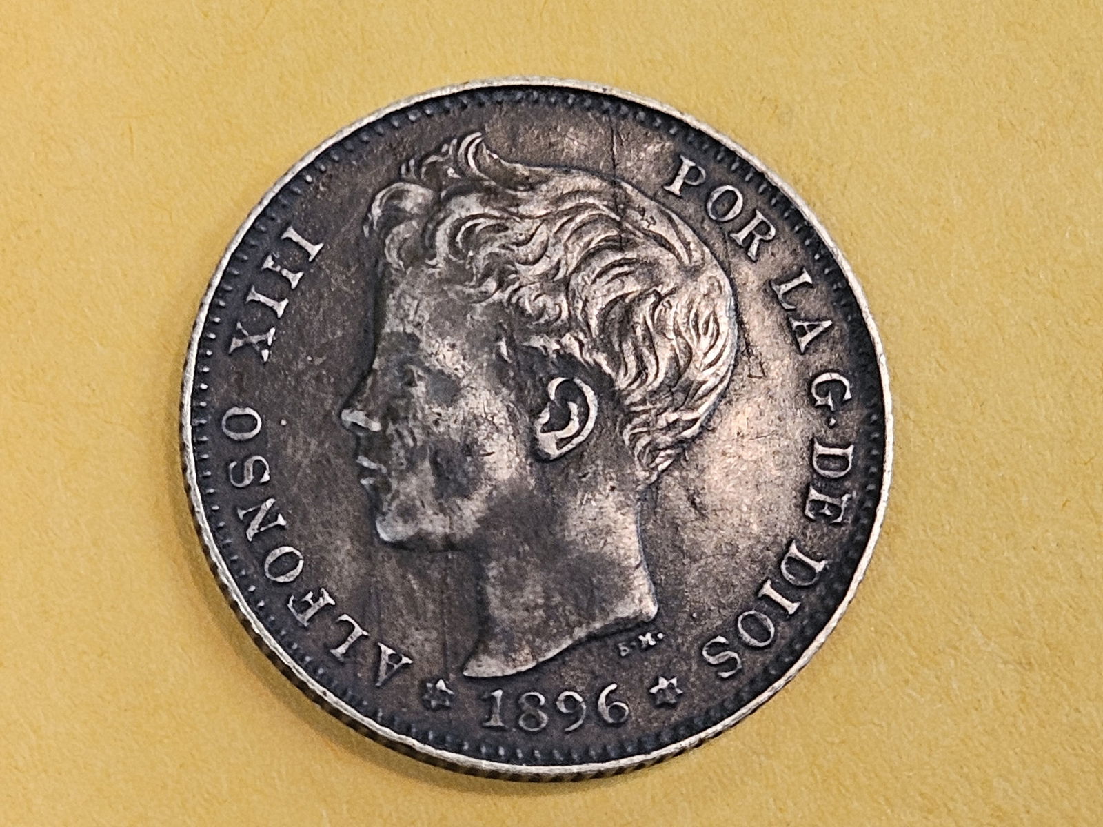 1896 Spain 1 peseta in Extra Fine: KM 706. Dirty 