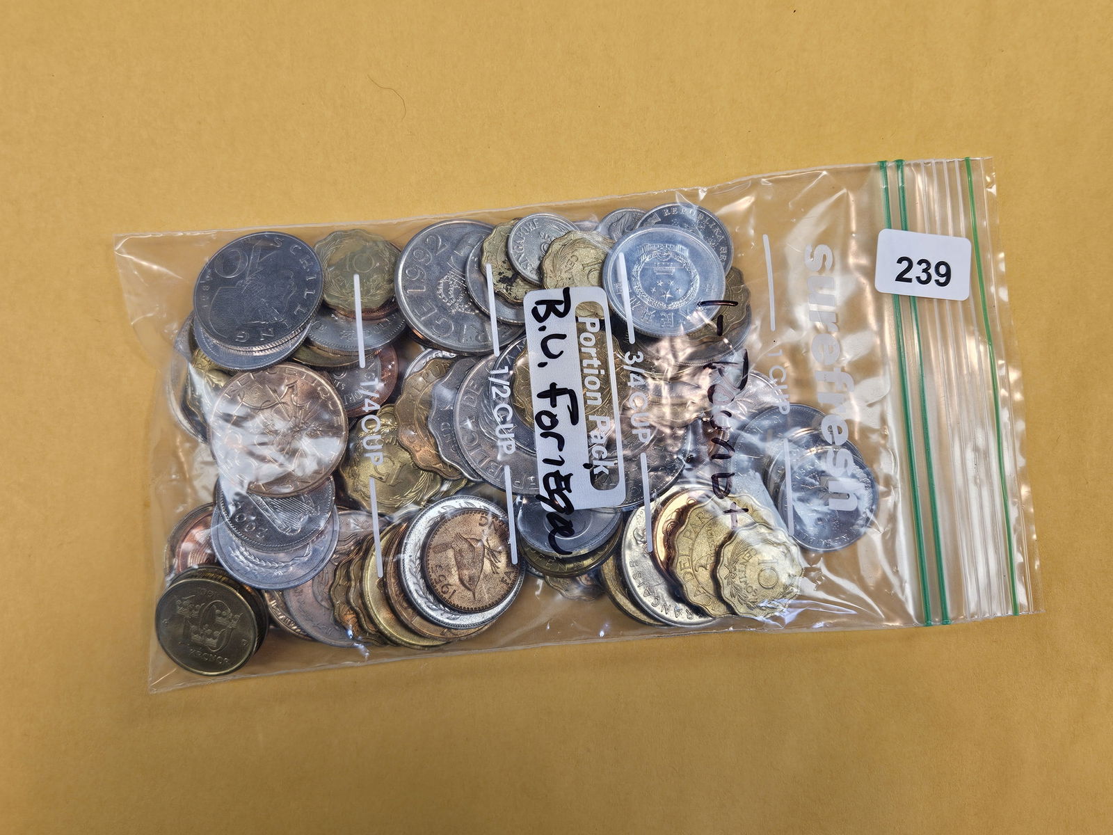 One Pound of Brilliant Uncirculated, mixed, World Coins: From dealer. Unsearched by us 