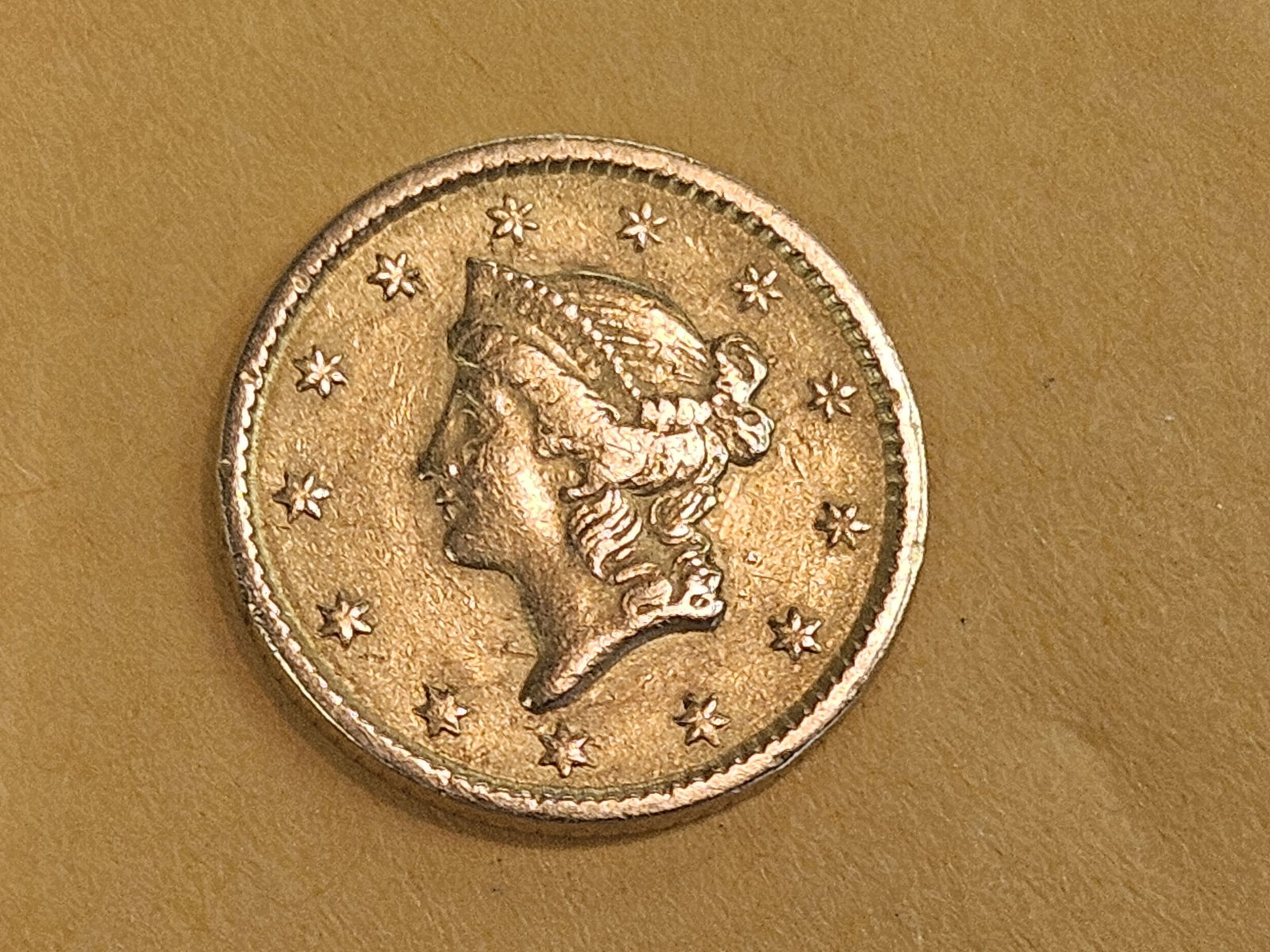 GOLD! Bright 1851 Gold Dollar: Lightly circulated 