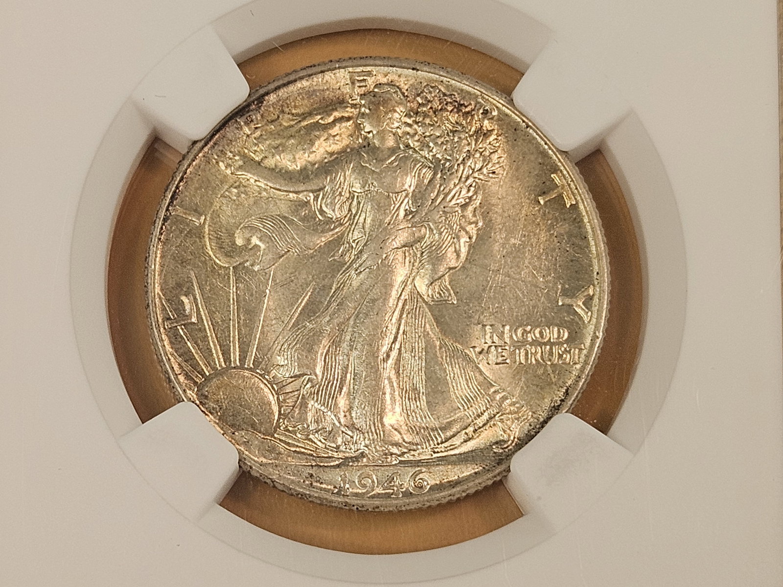 NGC 1946 Walking Liberty silver Half Dollar in Brilliant About Uncirculated - 55: Lovely golden patina 