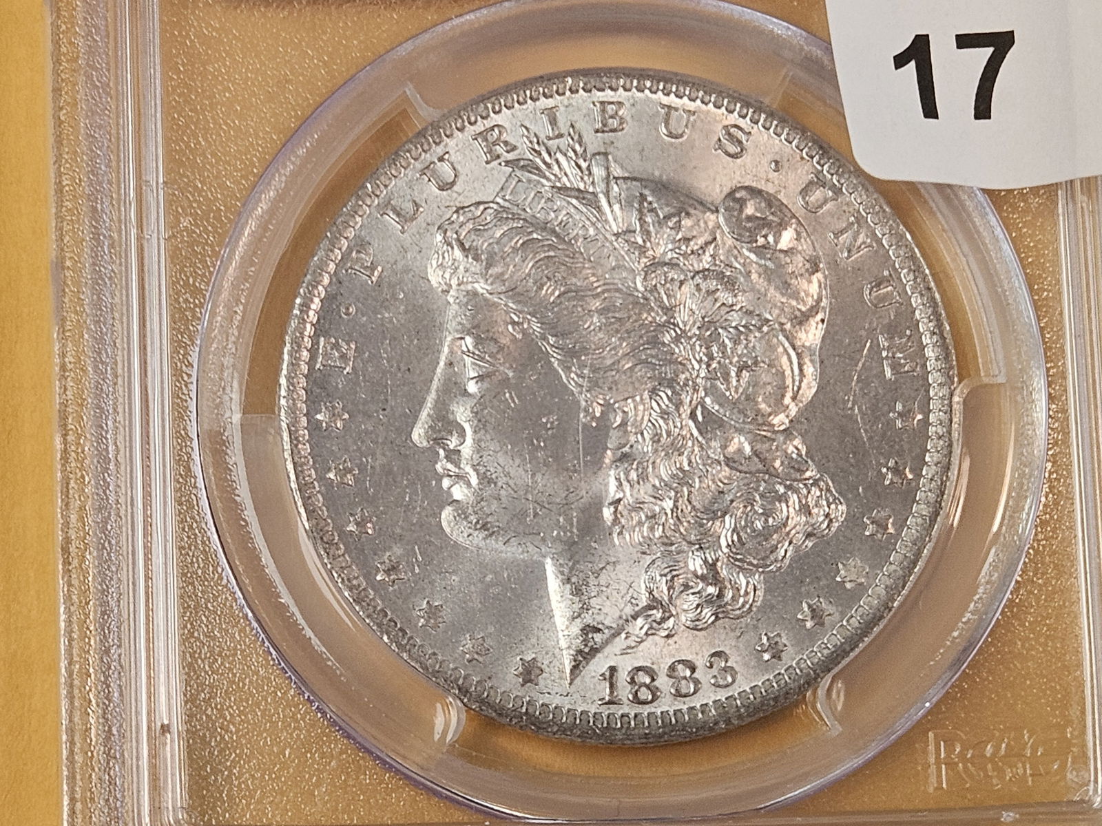 PCGS 1883-O Morgan Dollar in Mint State 63: Solid 
