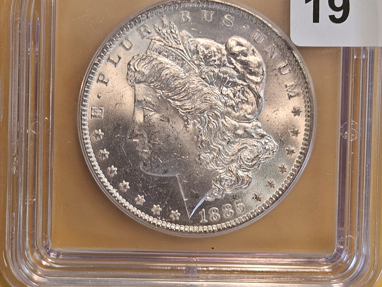 ICG 1885-O Morgan Dollar in Mint State 63: Blast White 