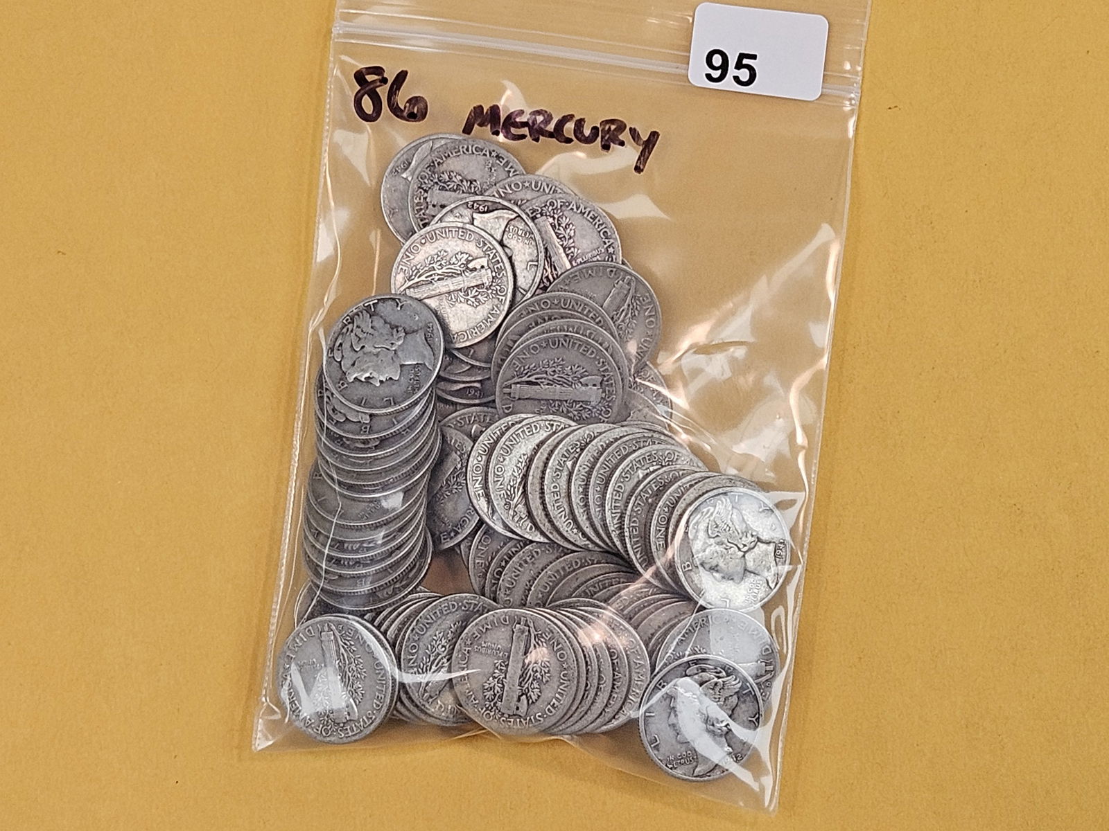 Eighty-six silver Mercury Dimes: Mixed. Circulated 