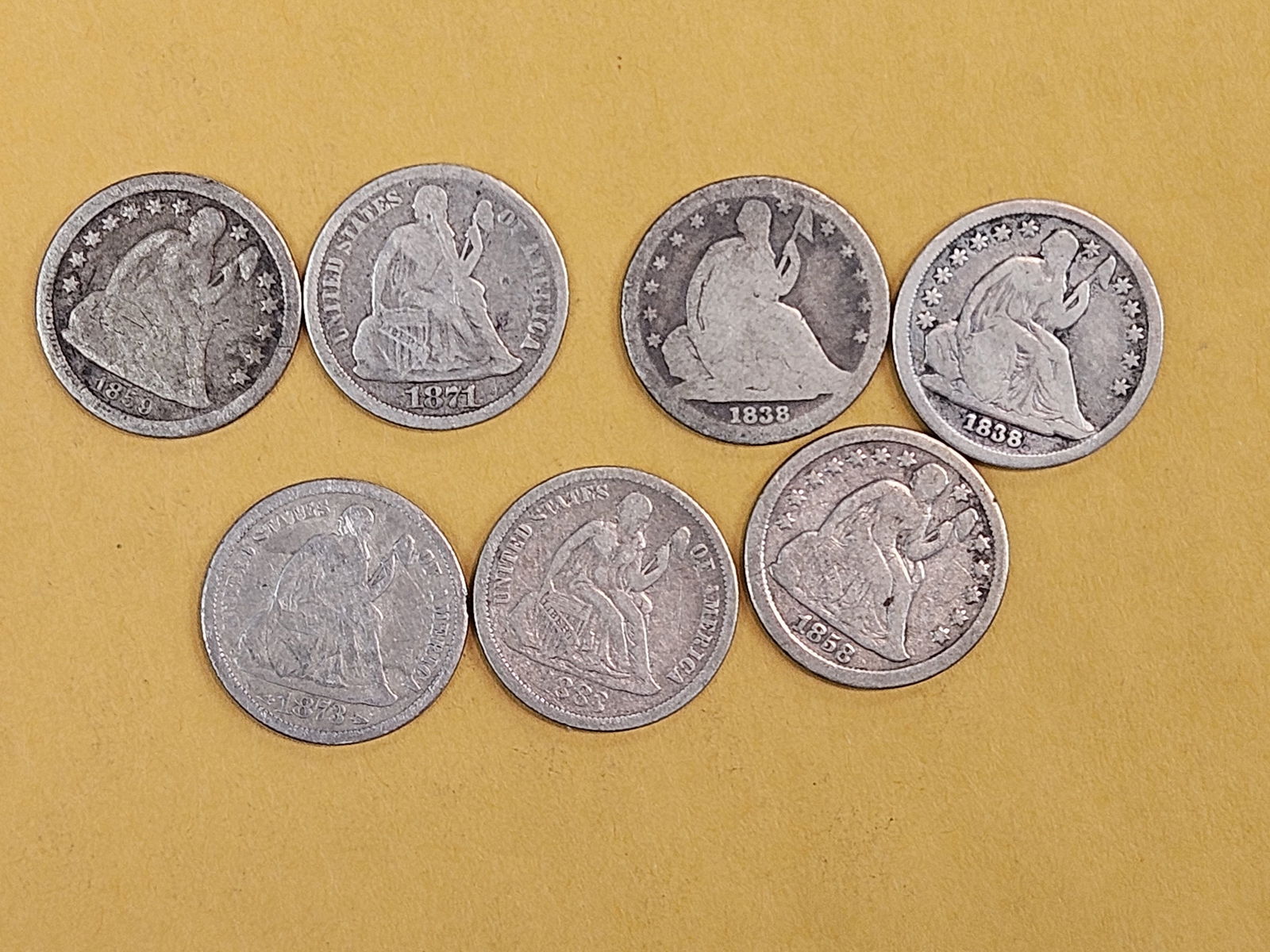 Seven mixed, silver, Seated Liberty Dimes: Circulated 
