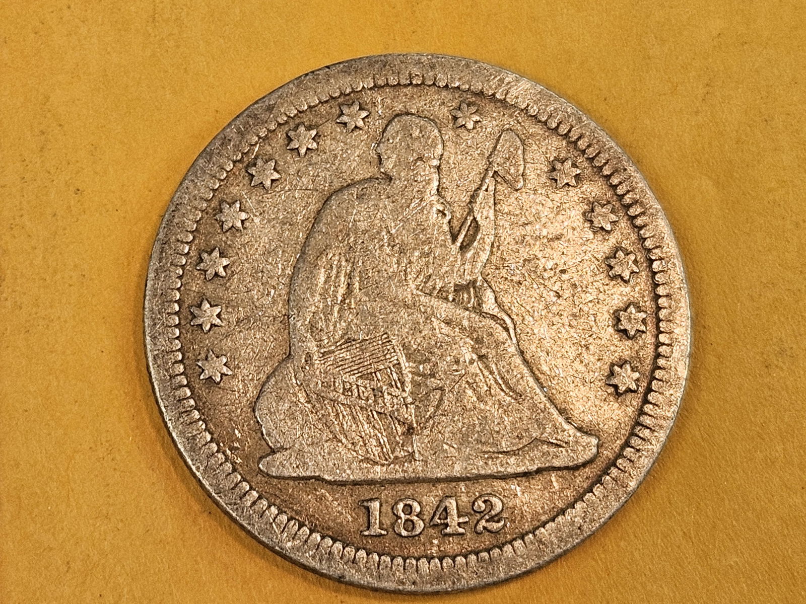 1842-O Seated Liberty silver Quarter: In Very Good 