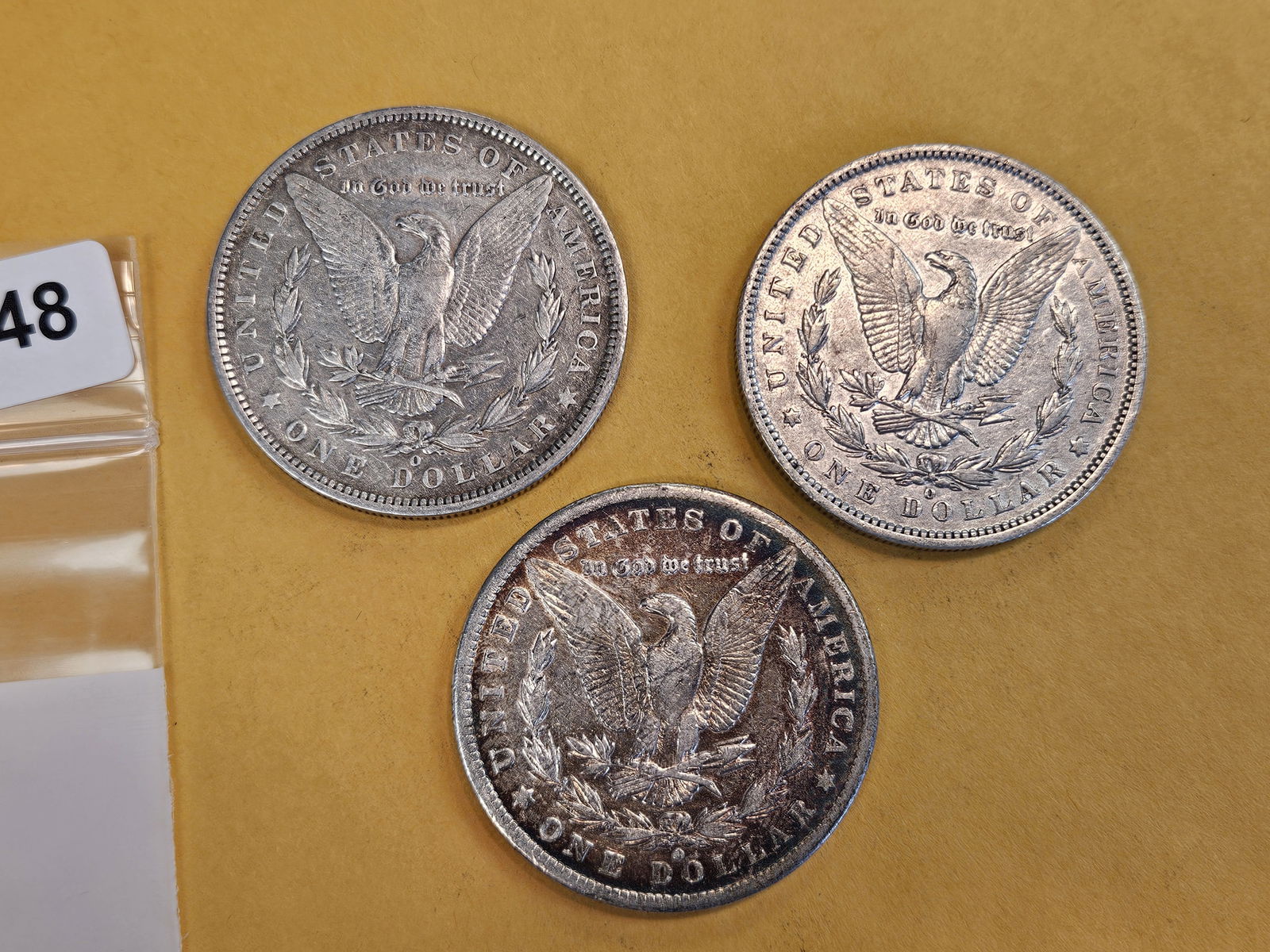 Three mixed Morgan Silver Dollars - 2