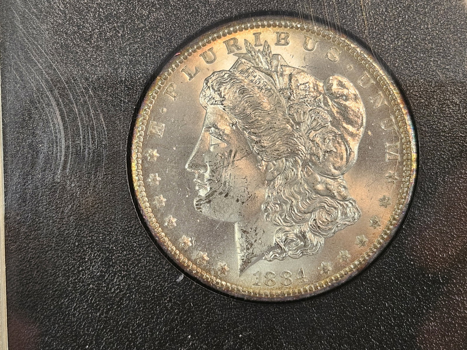 ** KEY DATE ** GSA 1884-CC Morgan Dollar in Choice Brilliant Uncirculated plus: KEY DATE! CARSON CITY! In original GSA hard-pack. No outer box or COA. Sharp and well-struck with a light toning around the periphery 