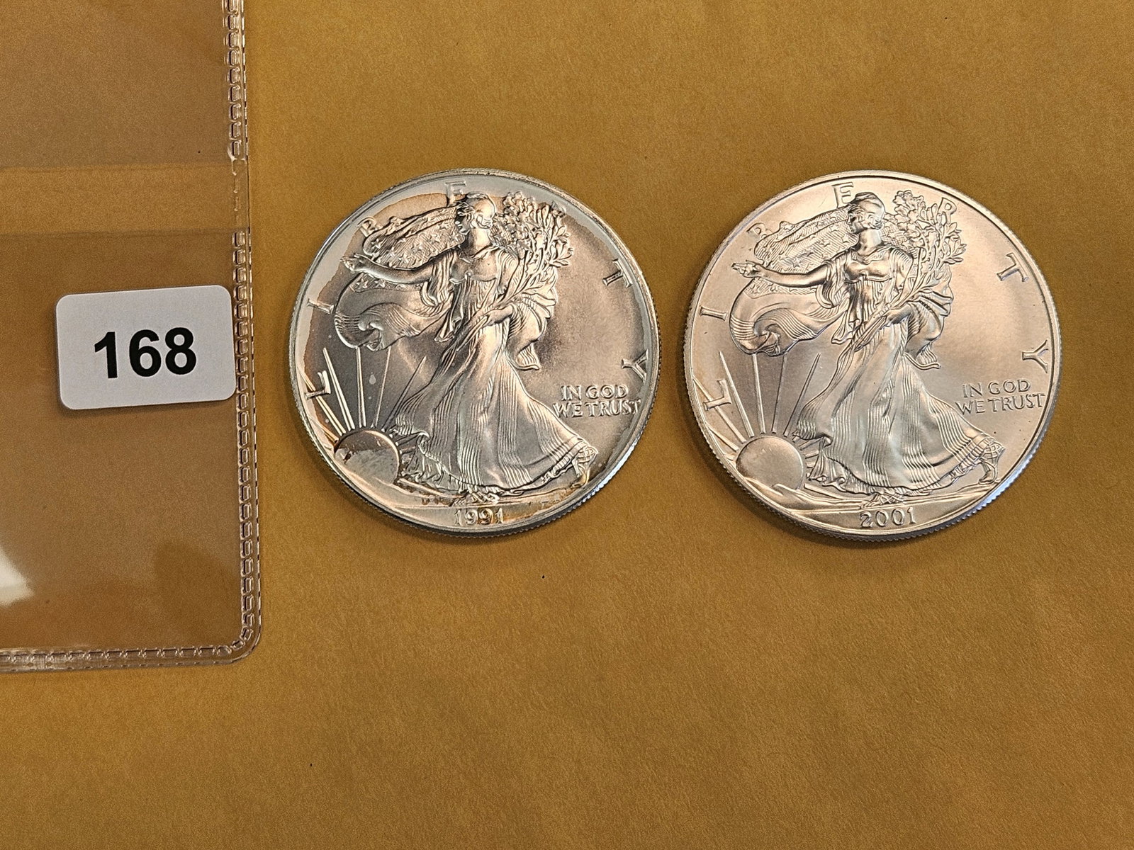 Two GEM Brilliant Uncirculated American Silver eagles: 1991 and 2001 