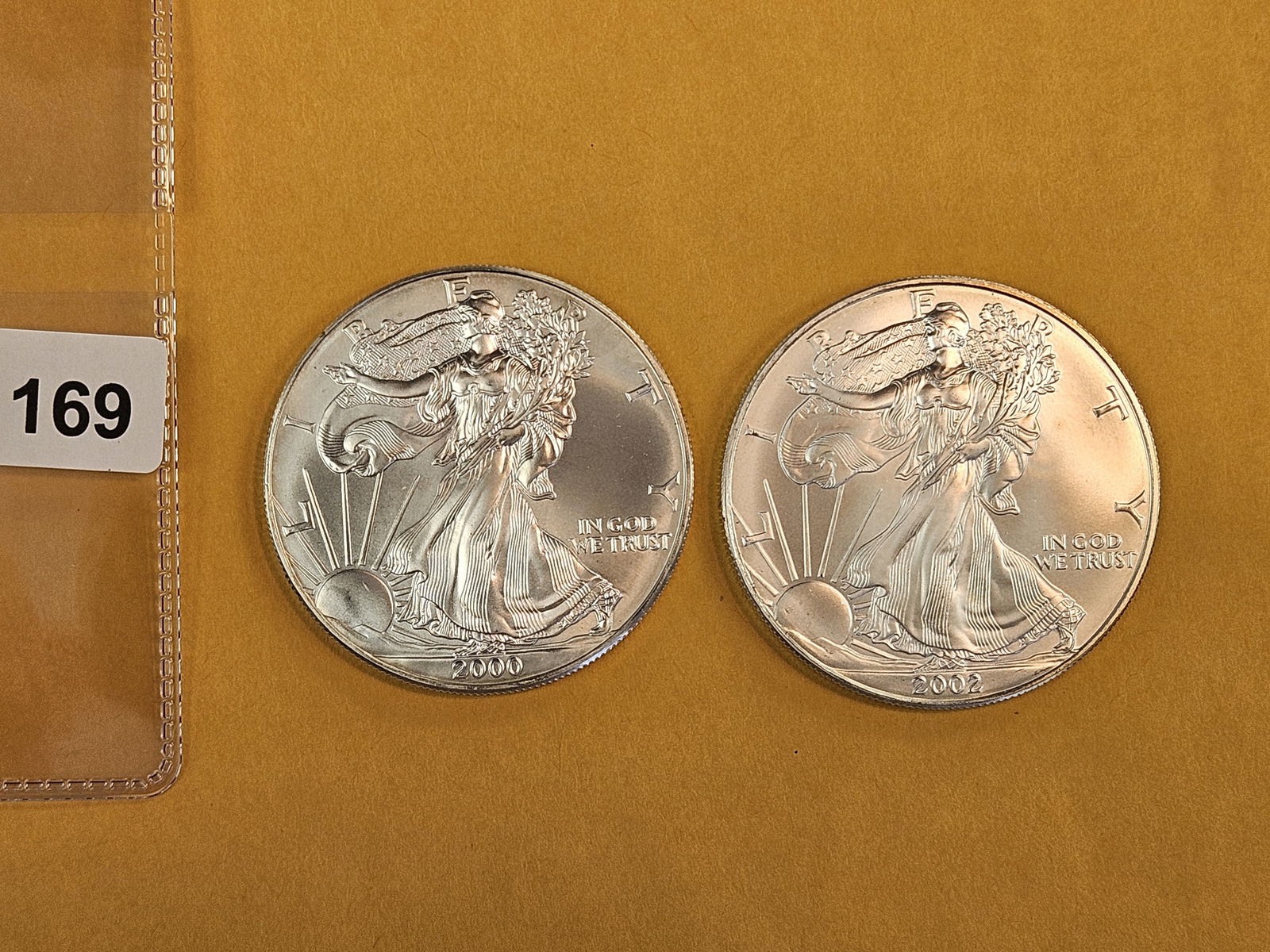Two GEM Brilliant Uncirculated American Silver eagles: 2000 and 2002 