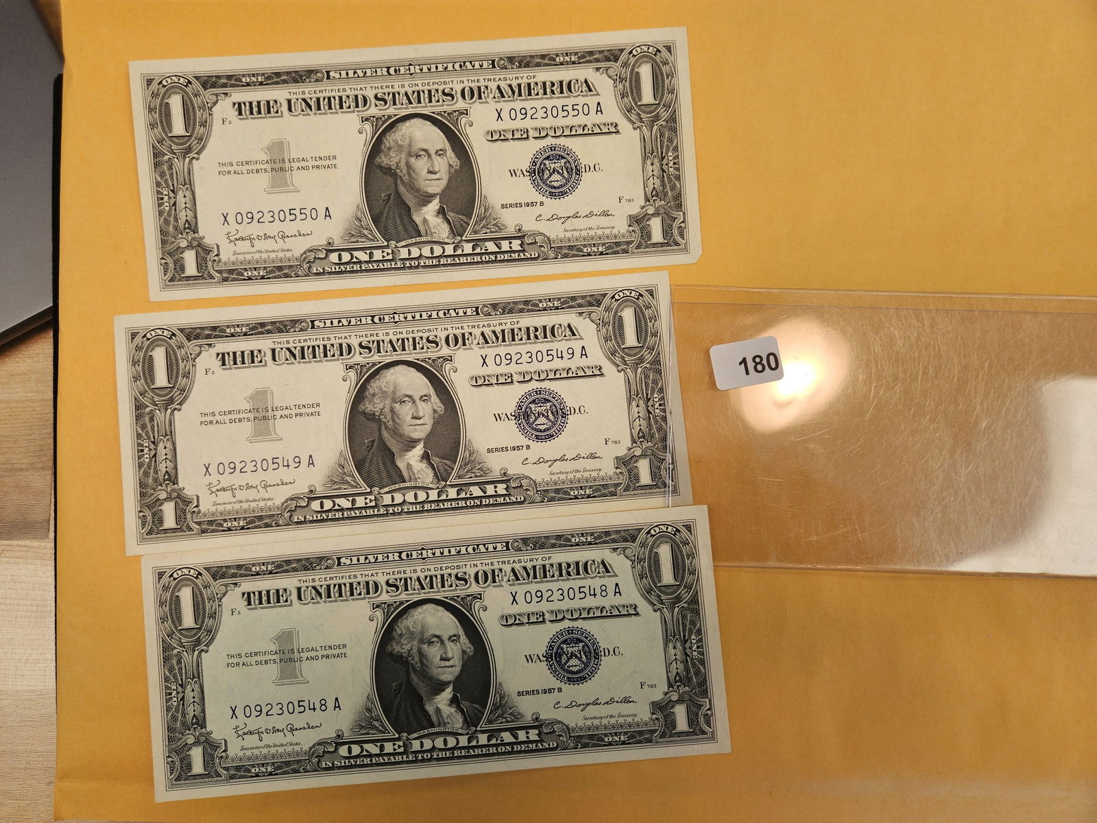 Three Crisp Uncirculated, sequential, One Dollar Silver Certificates (1 of 2)
