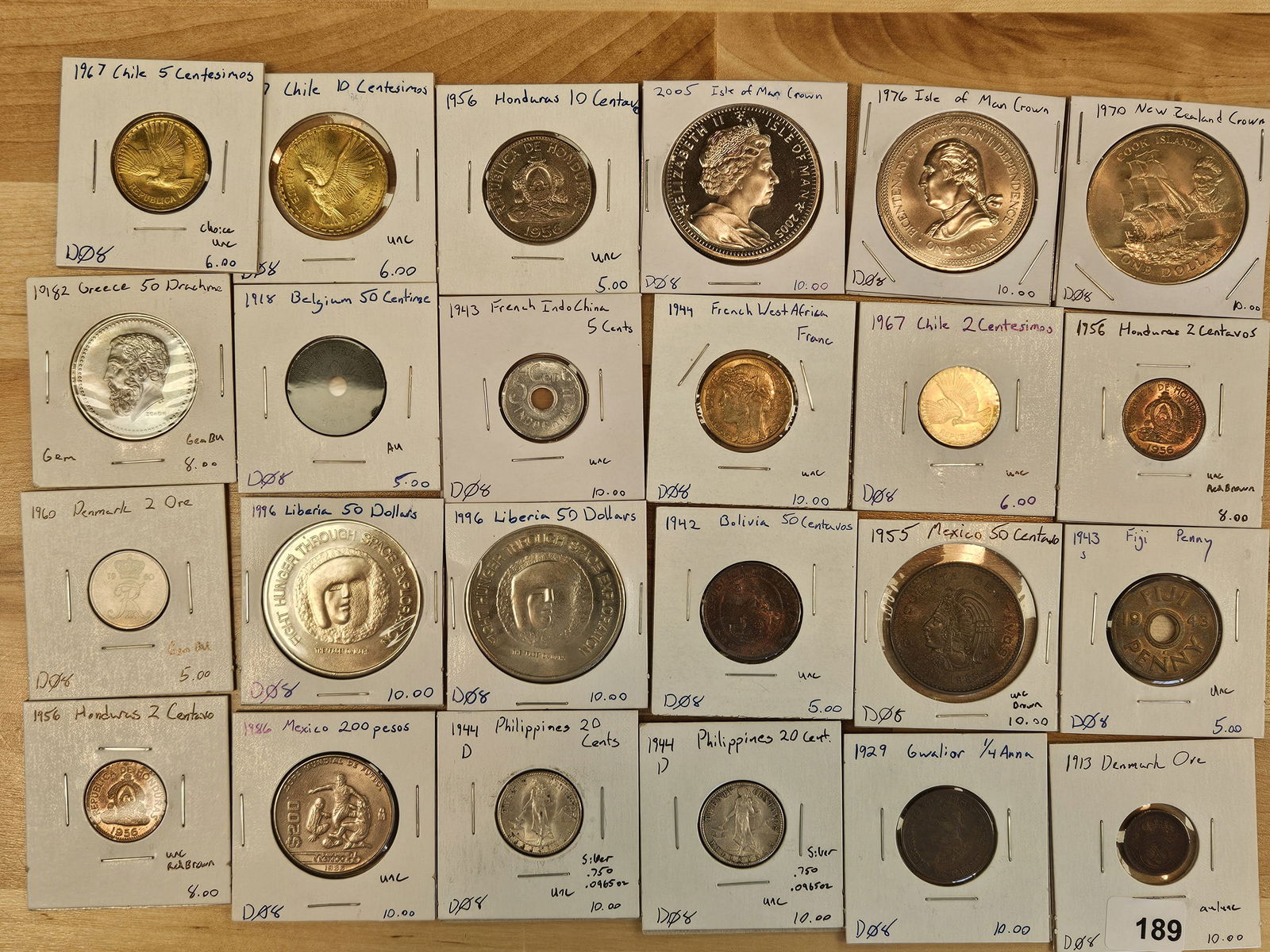 Twenty-four nice mixed World Coins: Many Brilliant Uncirculated! 