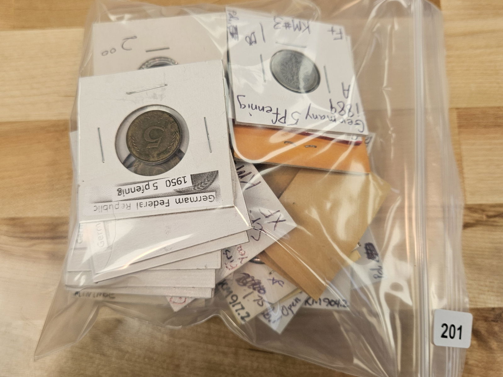 FIFTY mixed World coins: All in 2x2's. All identified with date, denomination, and KM number. Some silvers 