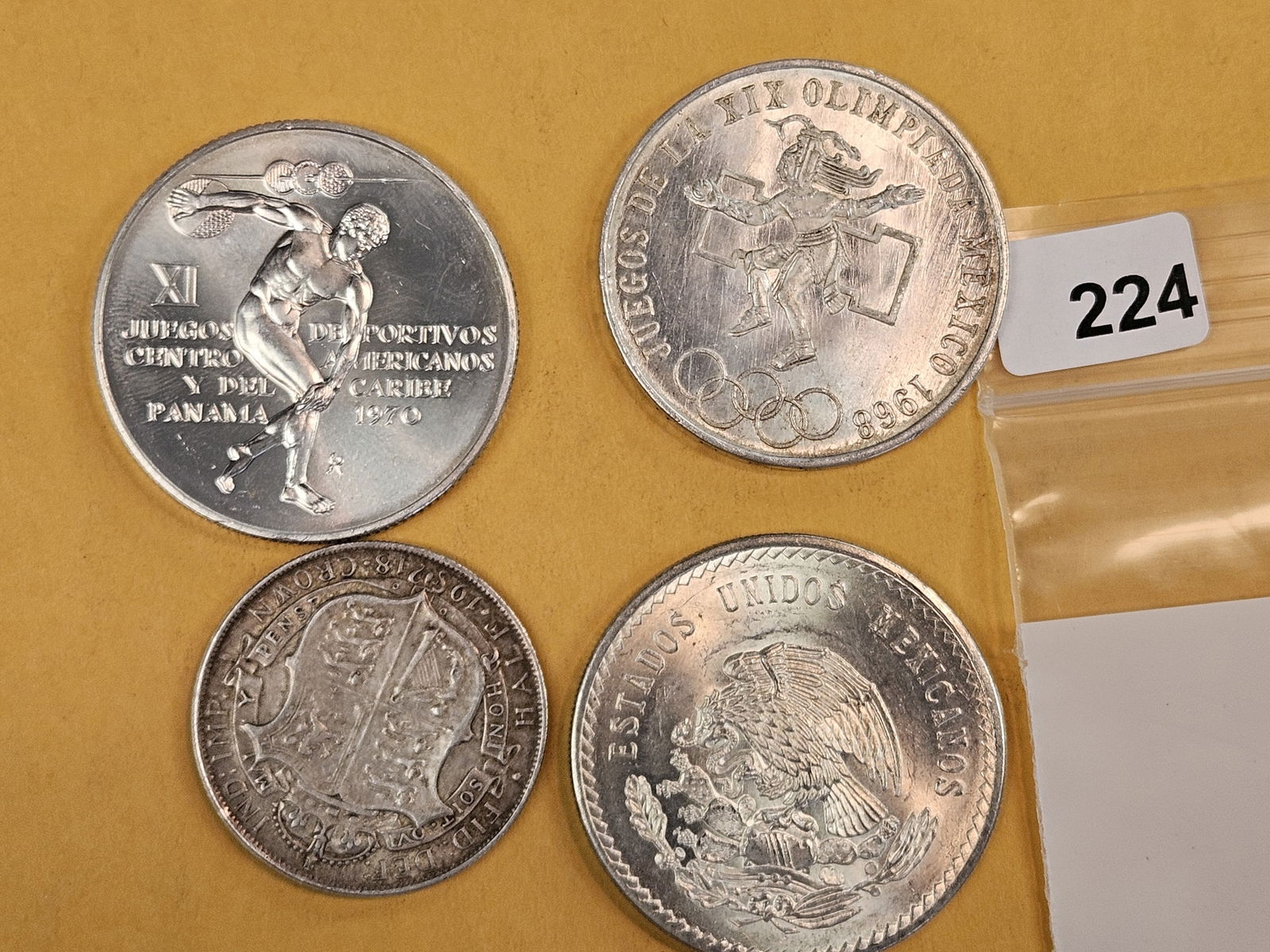 Four nicer, larger, World Silver Coins - 2